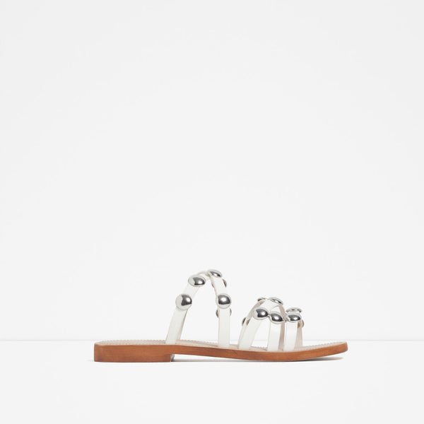 FLAT LEATHER STUDDED SANDALS