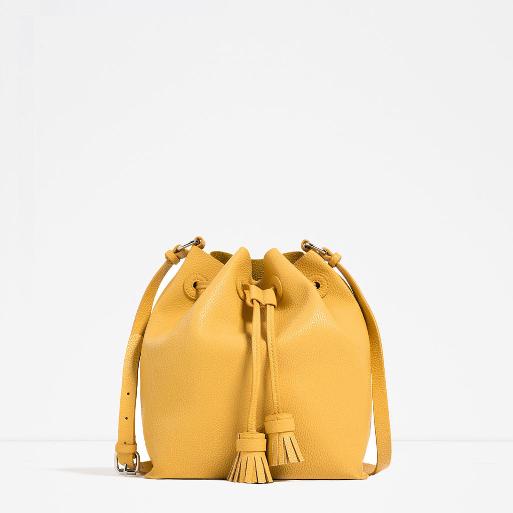 TASSELLED BUCKET BAG